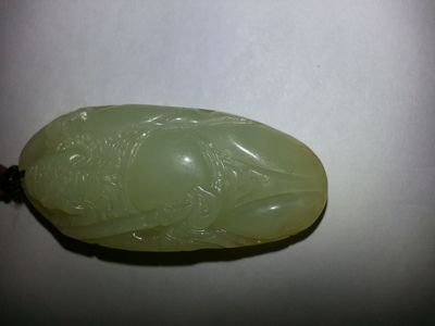 求高手指點這兩塊玉是什么品種,是和田玉還是青海還是韓料還是俄料。我買成3300,朋友說是和田的山料。